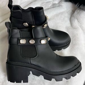 Black combat style boots with crystal accents, size 6